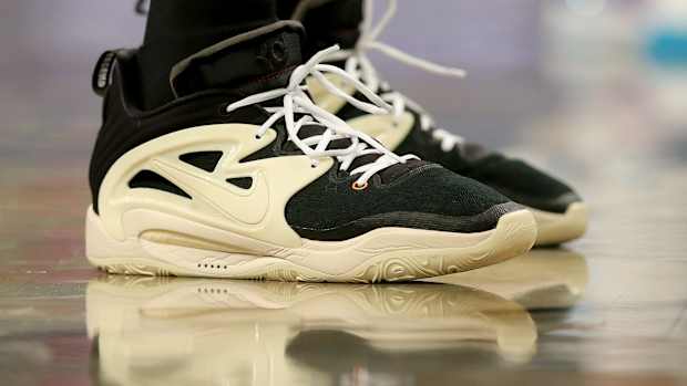 Black and sail Nike KD shoes.